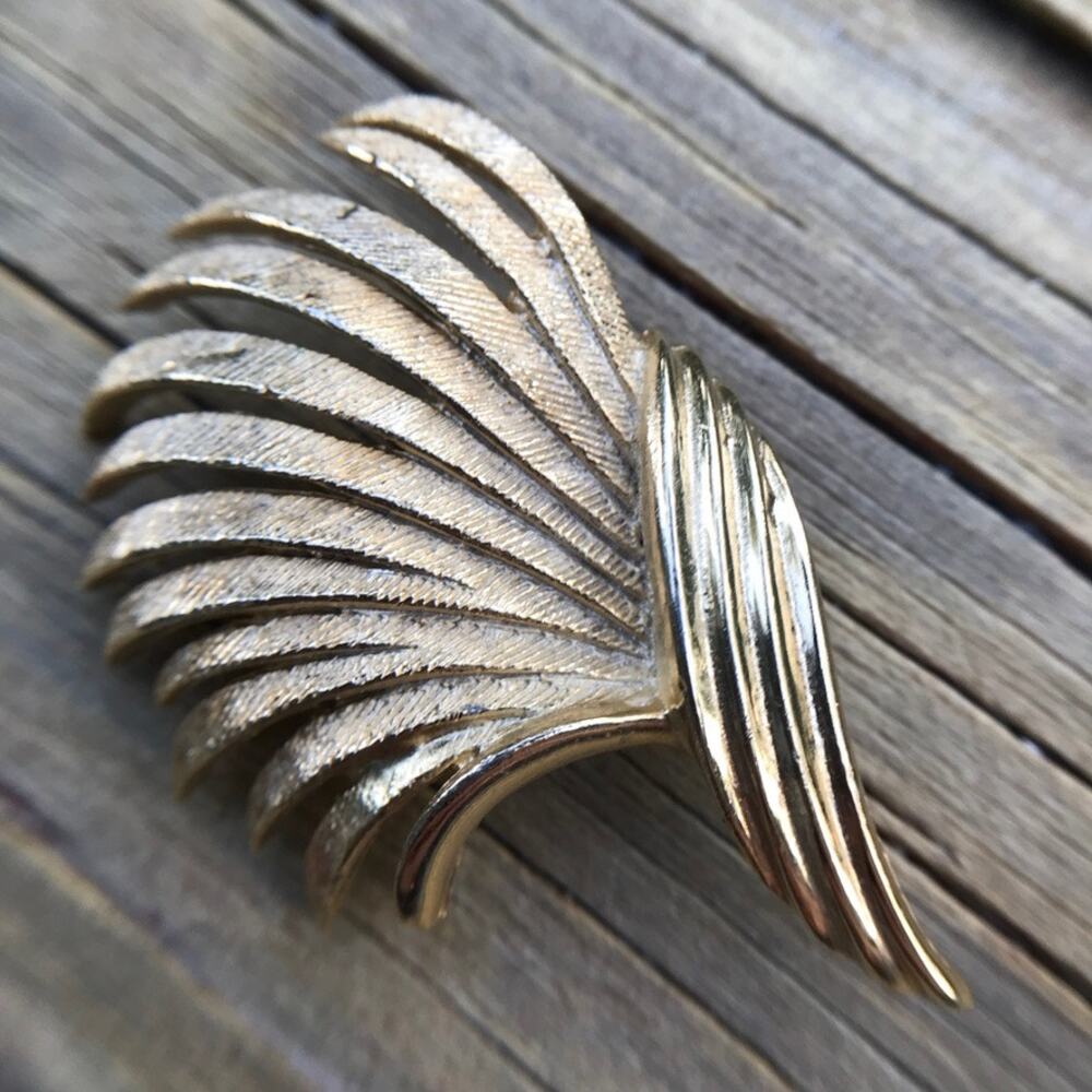 Estate signed CORO brushed gold tone textural swirl brooch / pin